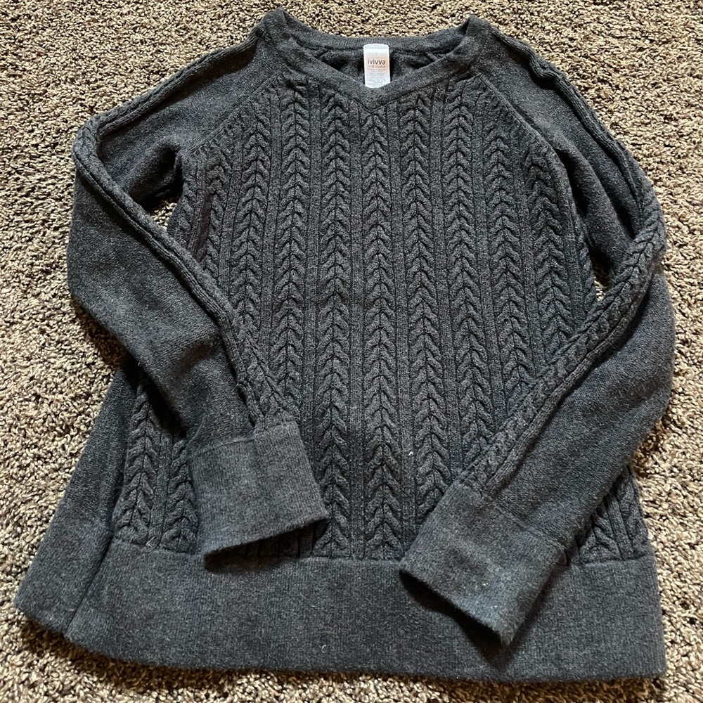Girls size 7 Ivivva Sweater. Discontinued brand. Excellent condition.